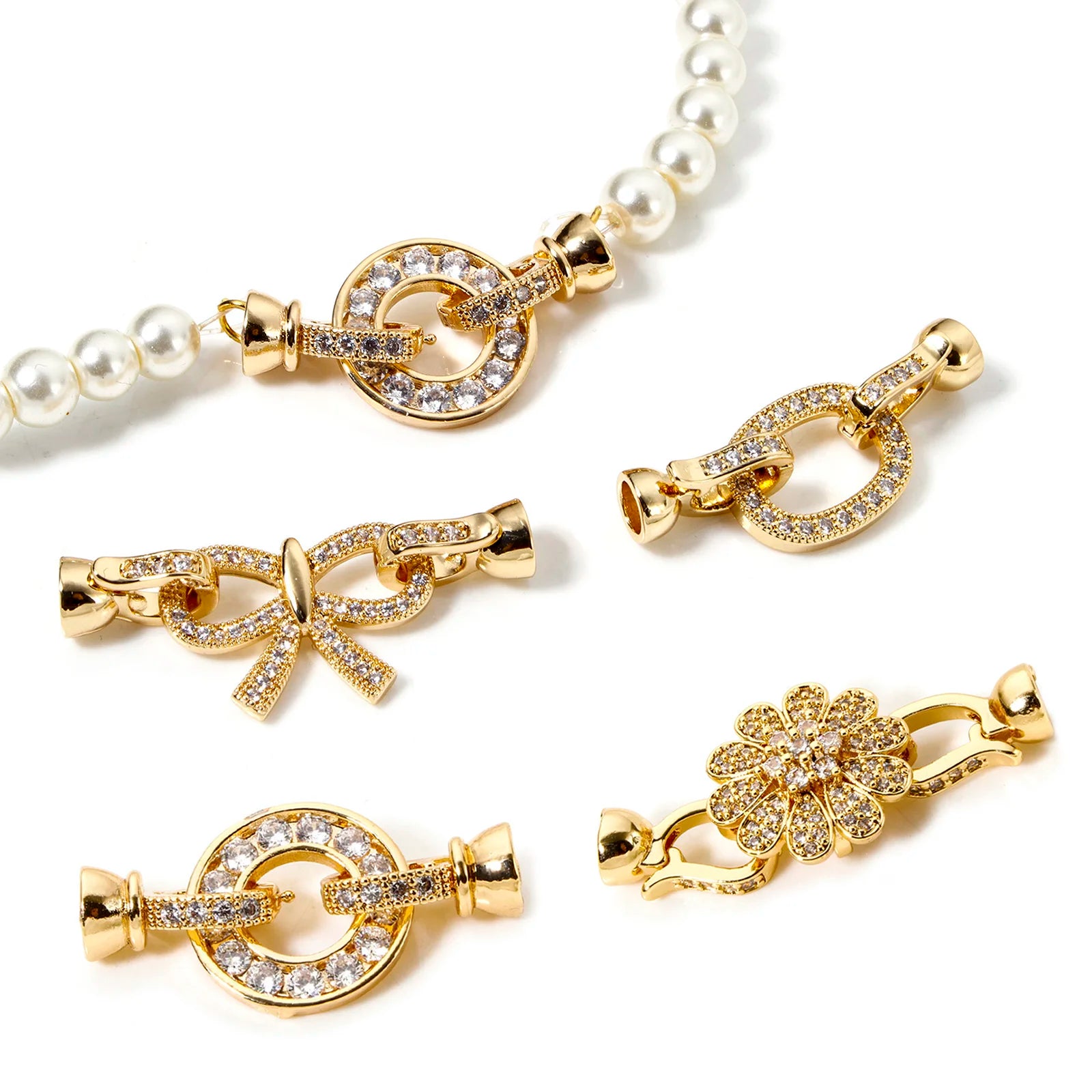 Gold Magnetic Clasps for Jewelry A set of gold-plated magnetic clasps with elegant and varied designs (circle, oval, flower, and bow). Ideal for necklaces and bracelets, they ensure practicality and a sophisticated finish to your handmade pieces.
