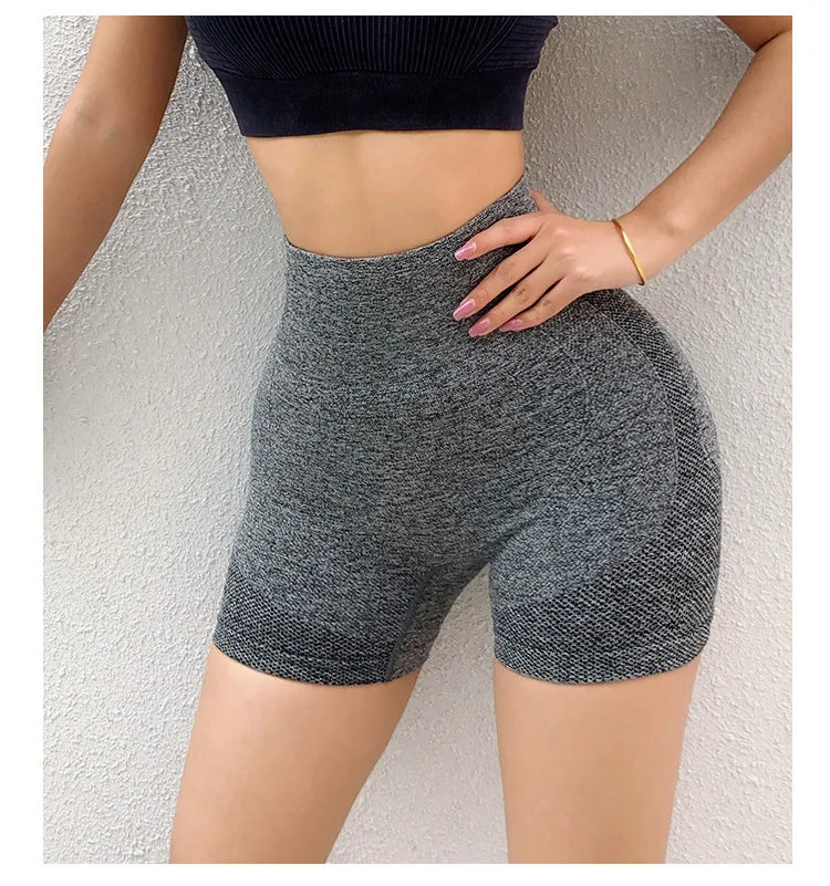 :  Women's Shapewear Fitness Shorts High-waisted, shapewear shorts that enhance curves, providing comfort and support during workouts. Available in several modern colors.
