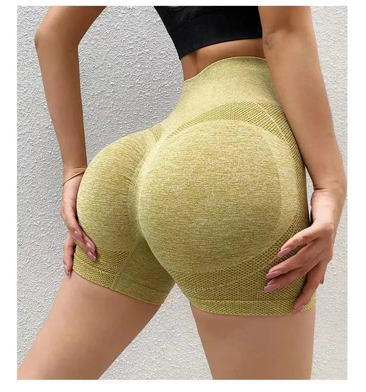 :  Women's Shapewear Fitness Shorts High-waisted, shapewear shorts that enhance curves, providing comfort and support during workouts. Available in several modern colors.