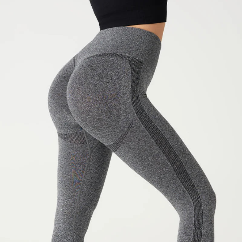Women's Sports Yoga Leggings Seamless, high-waisted leggings with stretchy fabric that shapes the body and offers maximum comfort. Ideal for yoga, workouts, or everyday wear with style and practicality.