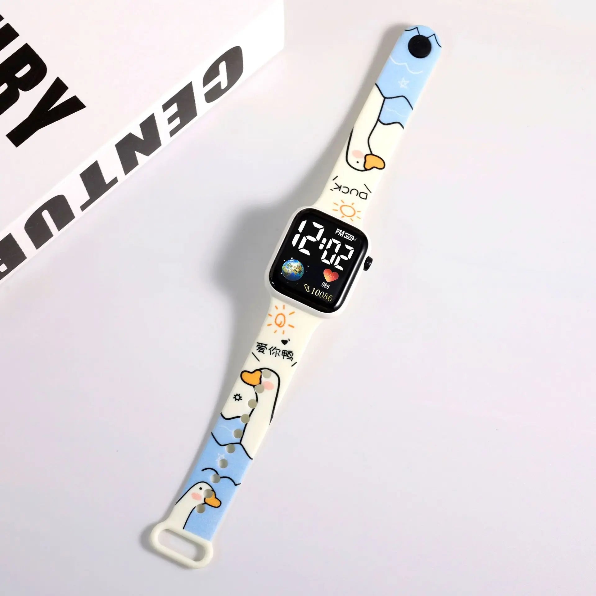 Printed Children's Watch Fun and stylish, this digital children's watch comes with a strap printed with cute characters, perfect for accompanying children's daily lives with lots of color and joy.