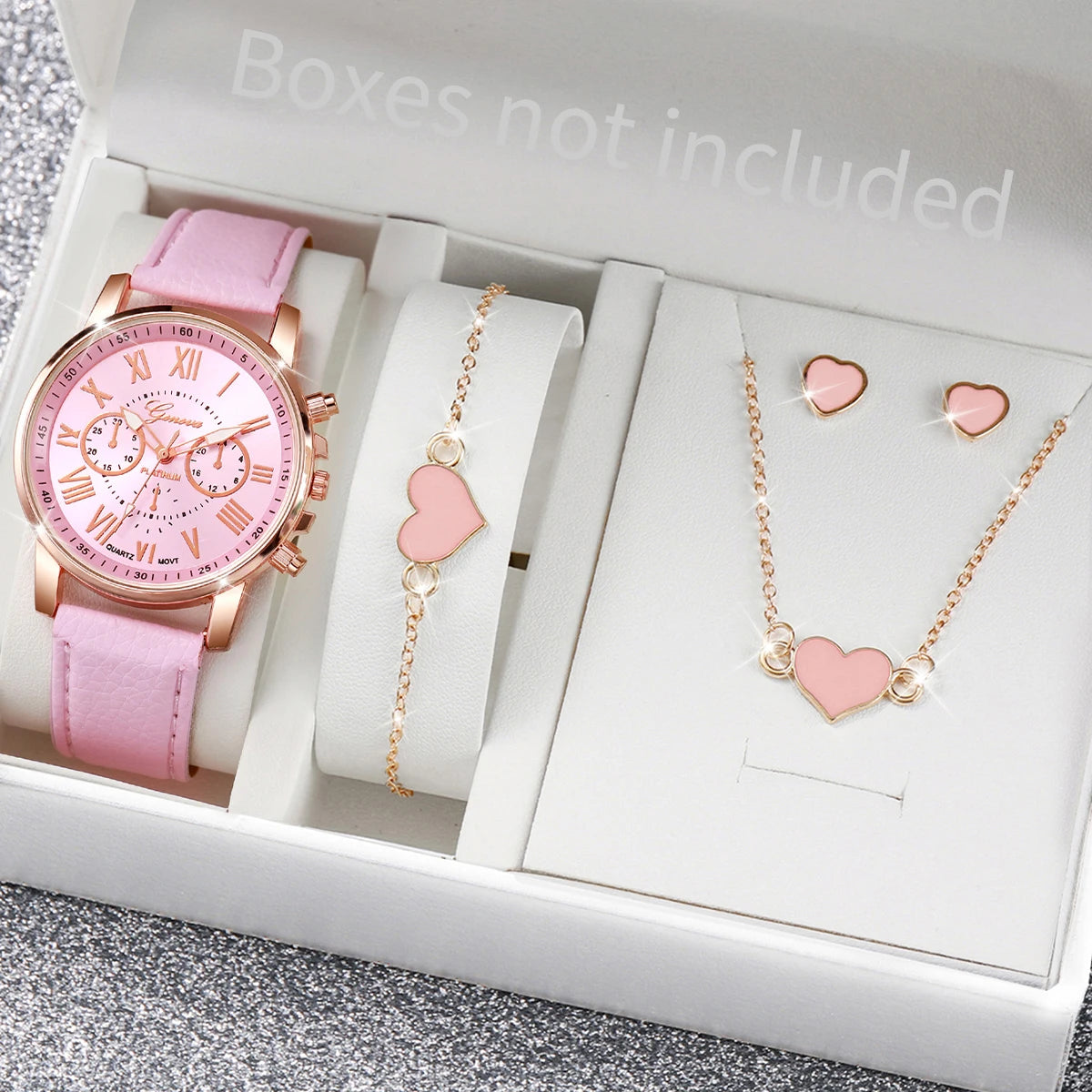 Women's Watch and Jewelry Set Elegant and delicate, this set includes a pink watch, bracelet, necklace, earrings, and ring with heart details and sparkling pink stones. Perfect for gifting or complementing your style.