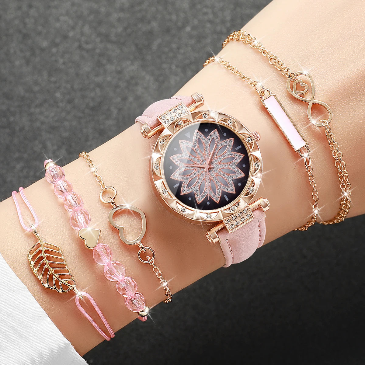 This elegant set includes a floral-designed wristwatch and delicate bracelets, all in rose gold tones. Ideal for those seeking versatility and beauty in accessories. (Boxes not included).