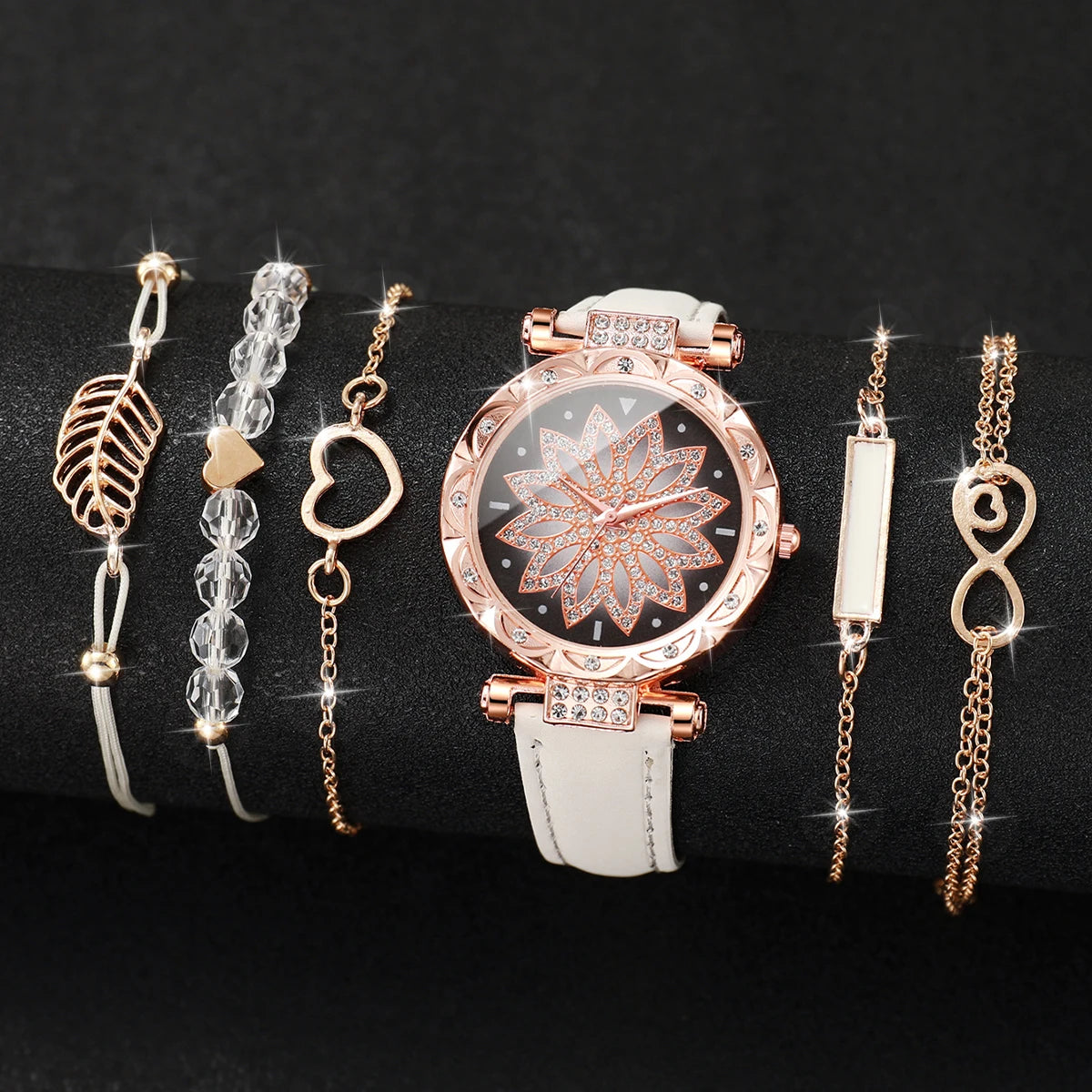 This elegant set includes a floral-designed wristwatch and delicate bracelets, all in rose gold tones. Ideal for those seeking versatility and beauty in accessories. (Boxes not included).