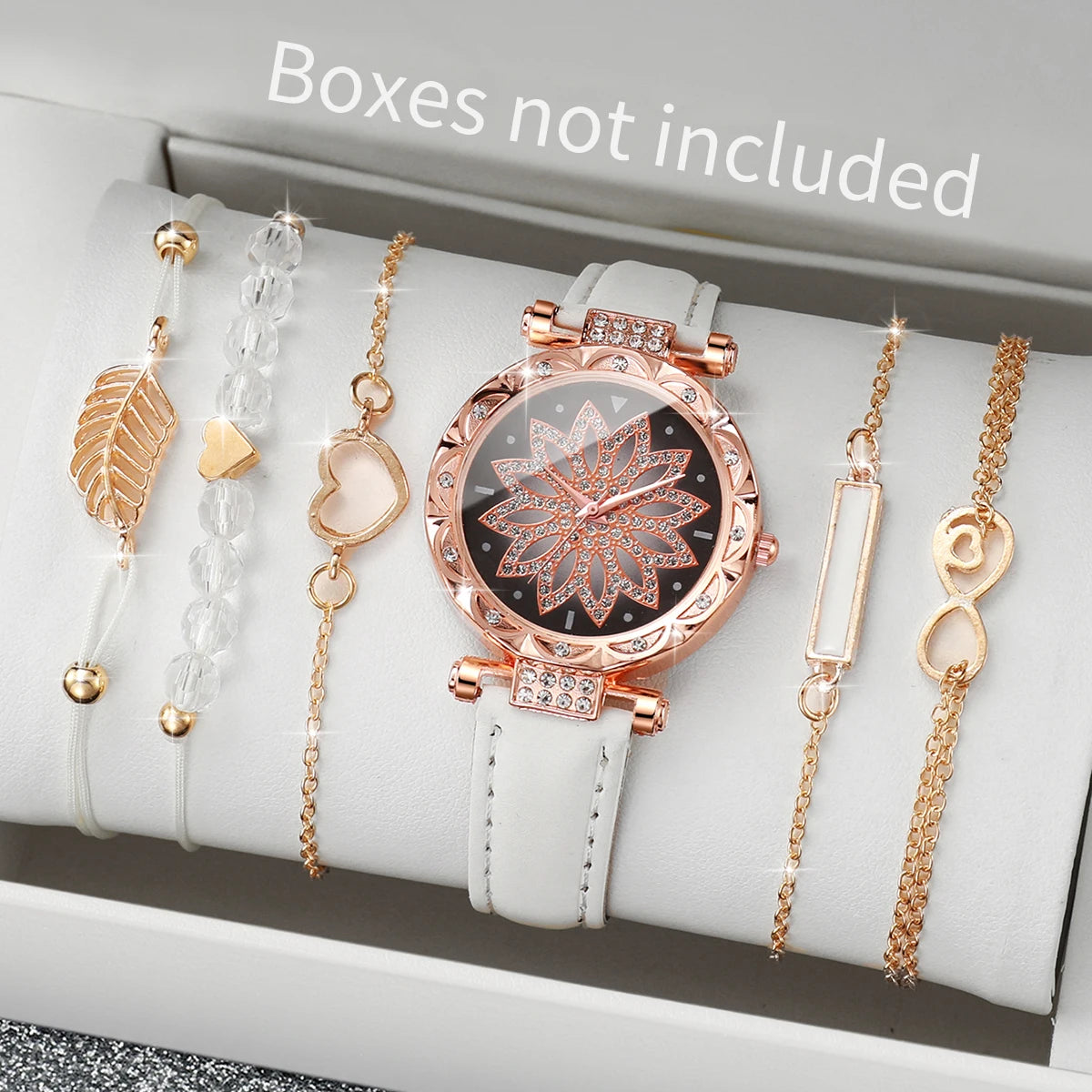 This elegant set includes a floral-designed wristwatch and delicate bracelets, all in rose gold tones. Ideal for those seeking versatility and beauty in accessories. (Boxes not included).
