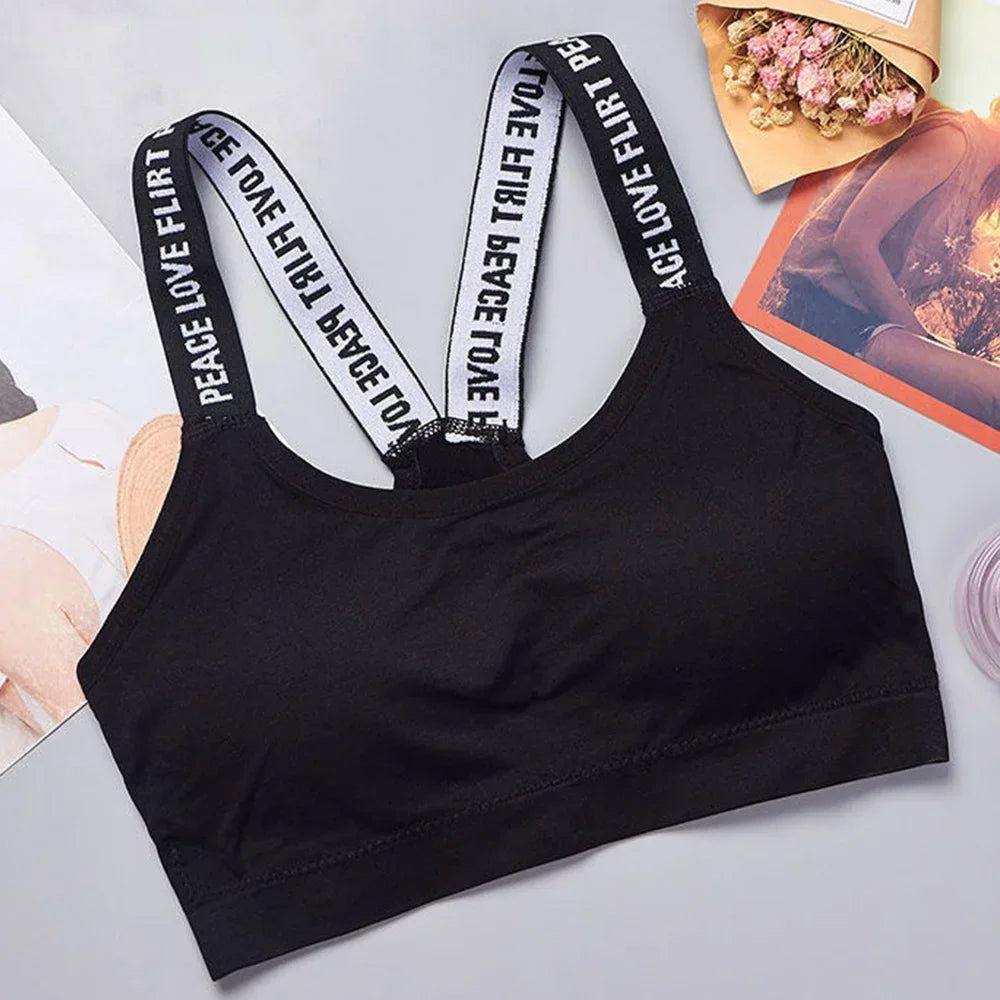 Strappy Bra – Comfort and Style  This bra, with a modern and elegant design, combines comfort and style for your everyday life. Its strappy design, with interlaced straps at the back, provides a unique look.