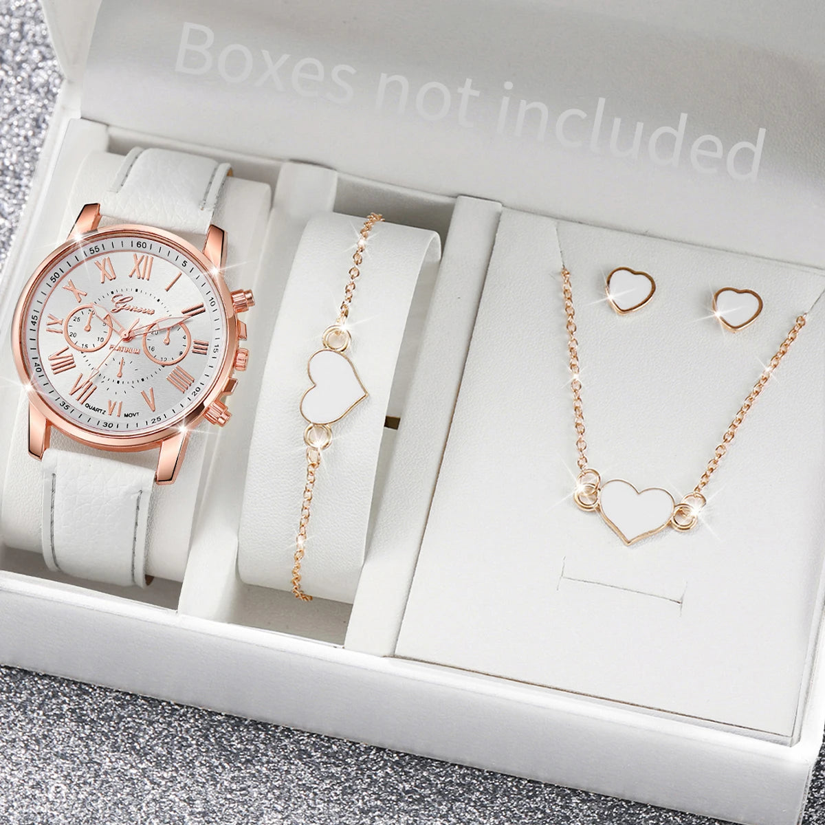 Women's Watch and Jewelry Set Elegant and delicate, this set includes a pink watch, bracelet, necklace, earrings, and ring with heart details and sparkling pink stones. Perfect for gifting or complementing your style.
