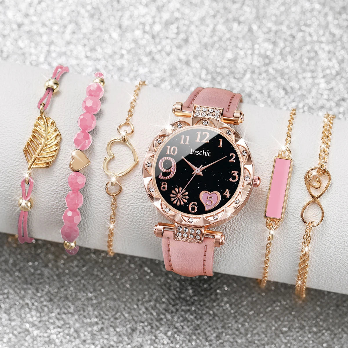 This elegant set includes a floral-designed wristwatch and delicate bracelets, all in rose gold tones. Ideal for those seeking versatility and beauty in accessories. (Boxes not included).