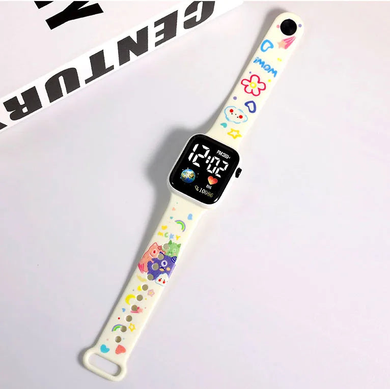 Printed Children's Watch Fun and stylish, this digital children's watch comes with a strap printed with cute characters, perfect for accompanying children's daily lives with lots of color and joy.