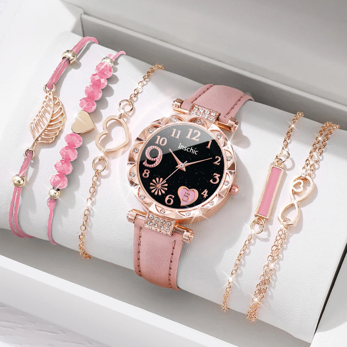 This elegant set includes a floral-designed wristwatch and delicate bracelets, all in rose gold tones. Ideal for those seeking versatility and beauty in accessories. (Boxes not included).