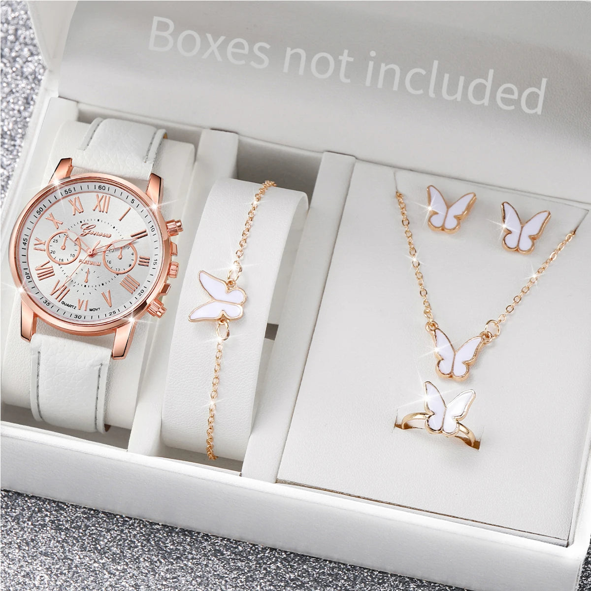 Women's Watch and Jewelry Set Elegant and delicate, this set includes a pink watch, bracelet, necklace, earrings, and ring with heart details and sparkling pink stones. Perfect for gifting or complementing your style.