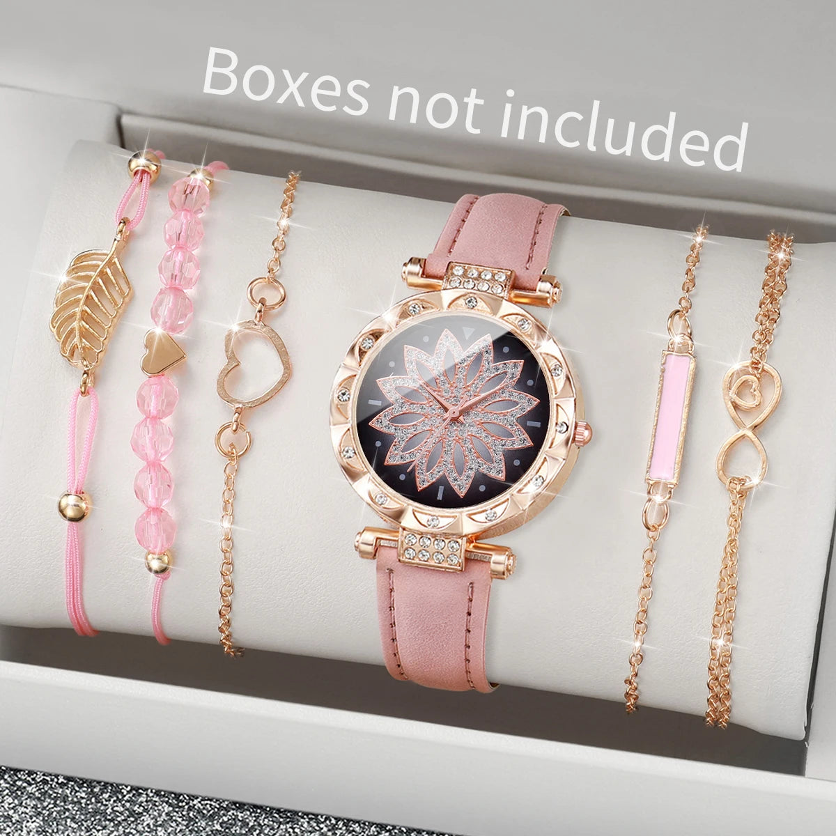 This elegant set includes a floral-designed wristwatch and delicate bracelets, all in rose gold tones. Ideal for those seeking versatility and beauty in accessories. (Boxes not included).