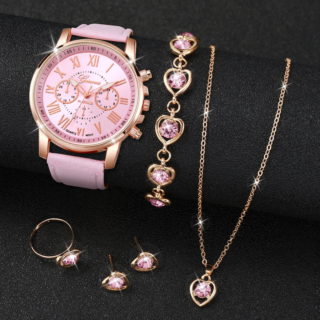 Women's Watch and Jewelry Set Elegant and delicate, this set includes a pink watch, bracelet, necklace, earrings, and ring with heart details and sparkling pink stones. Perfect for gifting or complementing your style.