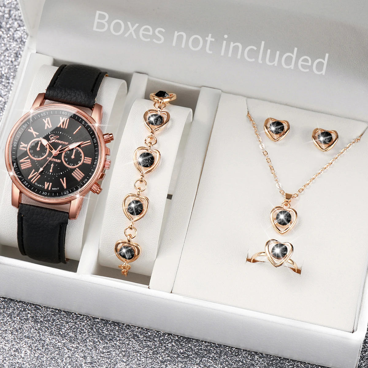 Women's Watch and Jewelry Set Elegant and delicate, this set includes a pink watch, bracelet, necklace, earrings, and ring with heart details and sparkling pink stones. Perfect for gifting or complementing your style.
