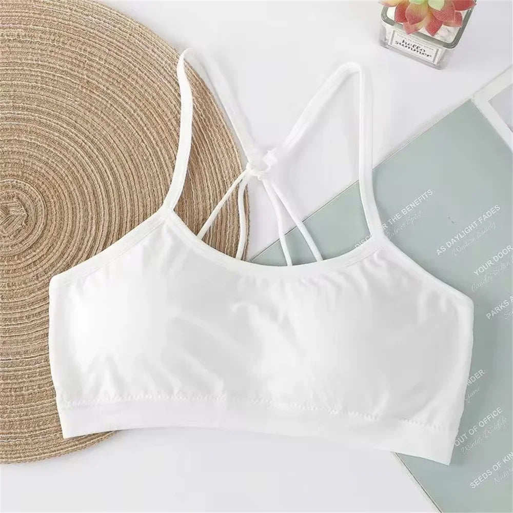 Strappy Bra – Comfort and Style  This bra, with a modern and elegant design, combines comfort and style for your everyday life. Its strappy design, with interlaced straps at the back, provides a unique look.
