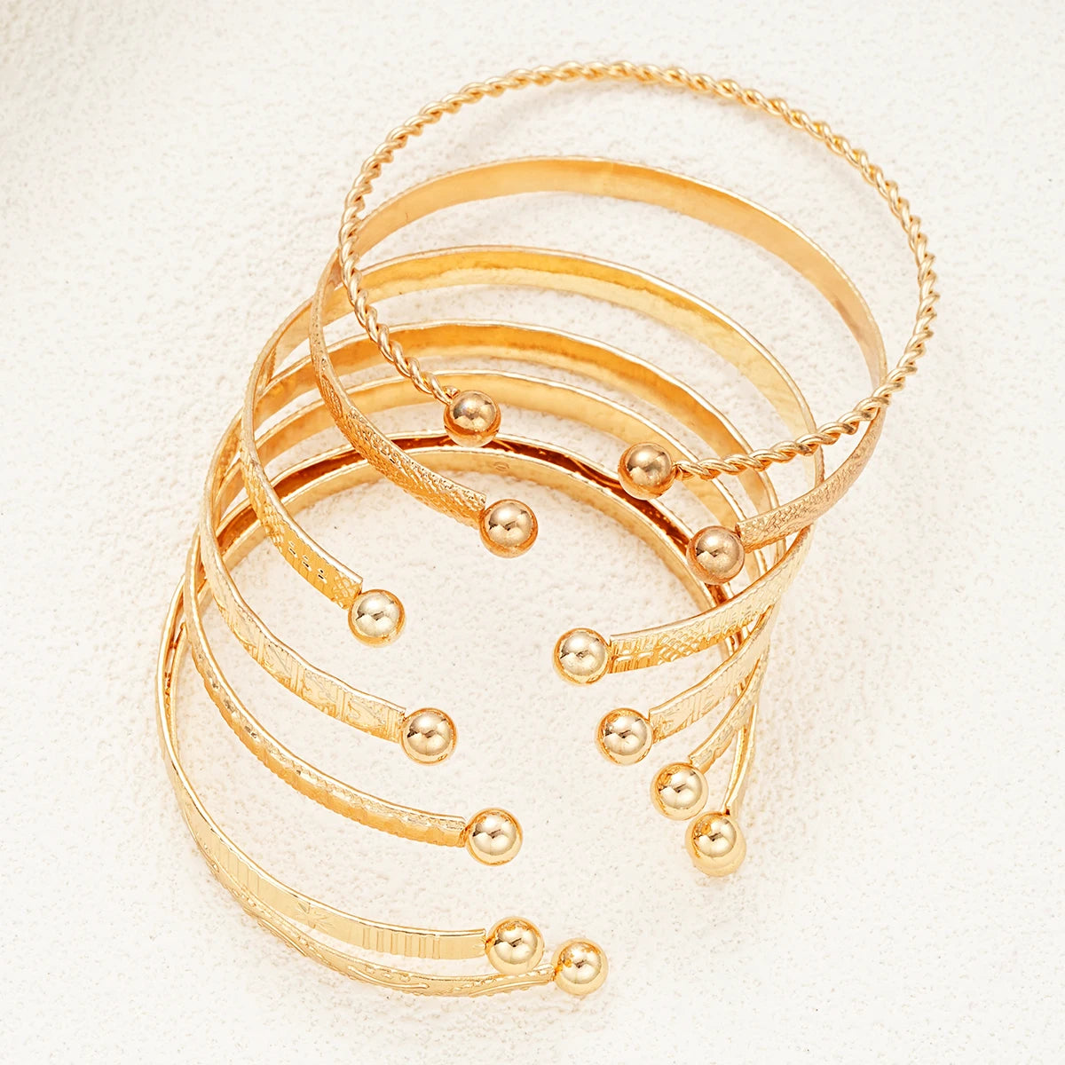 Composed of 7 gold punk bracelets for women, street fashion, gothic heart prints, metal design, open bracelet, fashion jewelry