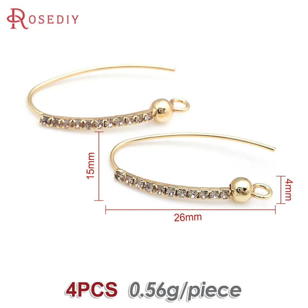 Gold Earrings with Crystals Delicate and sophisticated, these gold earrings feature a curved design with sparkling crystals, perfect for adding a touch of elegance to your look.