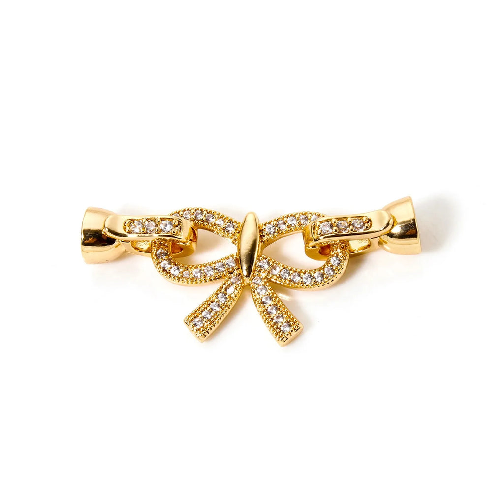 Gold Magnetic Clasps for Jewelry A set of gold-plated magnetic clasps with elegant and varied designs (circle, oval, flower, and bow). Ideal for necklaces and bracelets, they ensure practicality and a sophisticated finish to your handmade pieces.