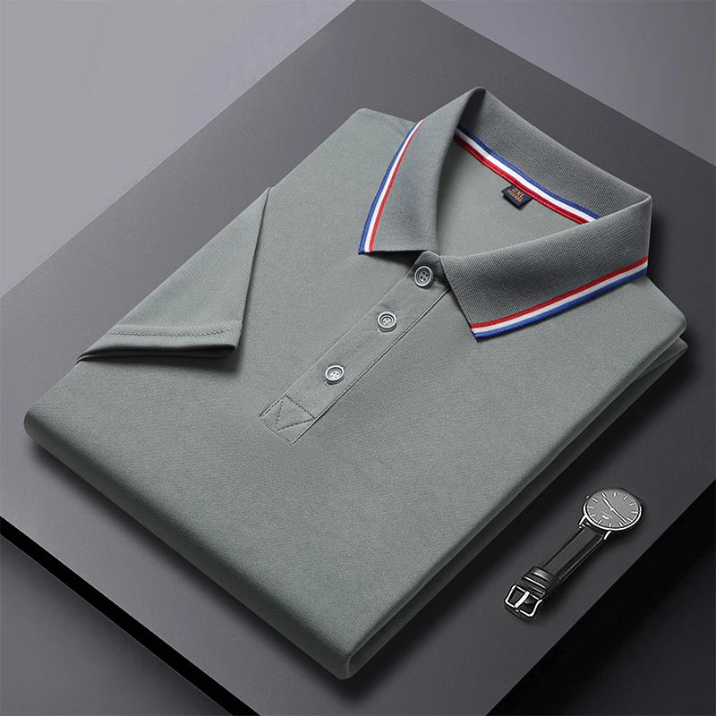 Men's Polo Shirt Men's polo shirt with a classic collar and striped details. Made from lightweight, comfortable fabric, perfect for a stylish, modern everyday look.